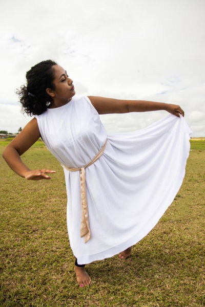 worship dancer with light gold and white praise dance dress